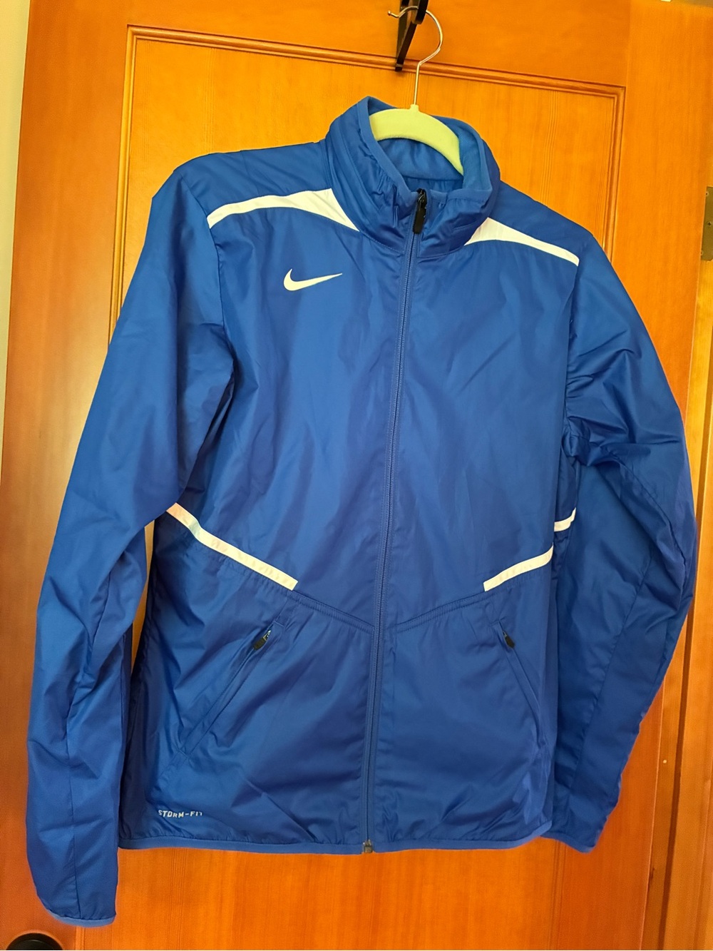 Nike Women’s Blue Storm Fit Windbreaker Jacket with White Accents